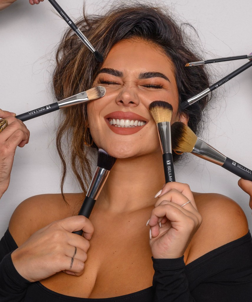 Sellma with makeup brushes